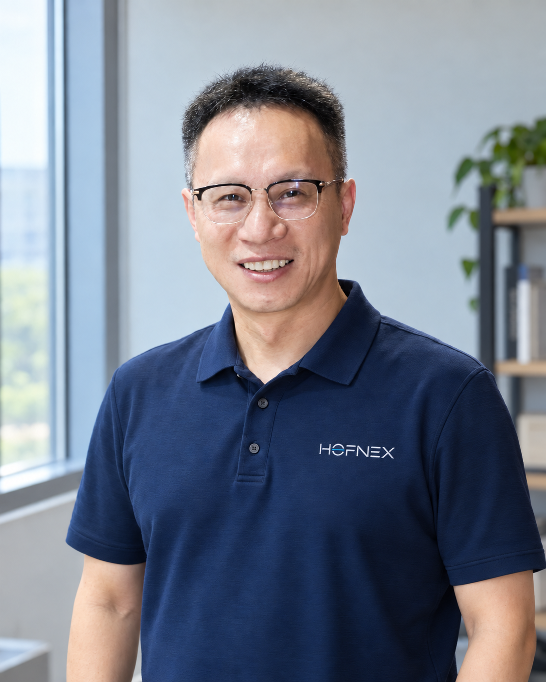 Robert Law wearing a navy HOFNEX polo shirt